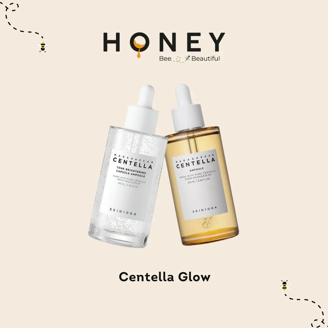 Serum Skin1004 Madagascar Centella con goteros, envases transparente y ámbar, marca Honey y abejas decorativas